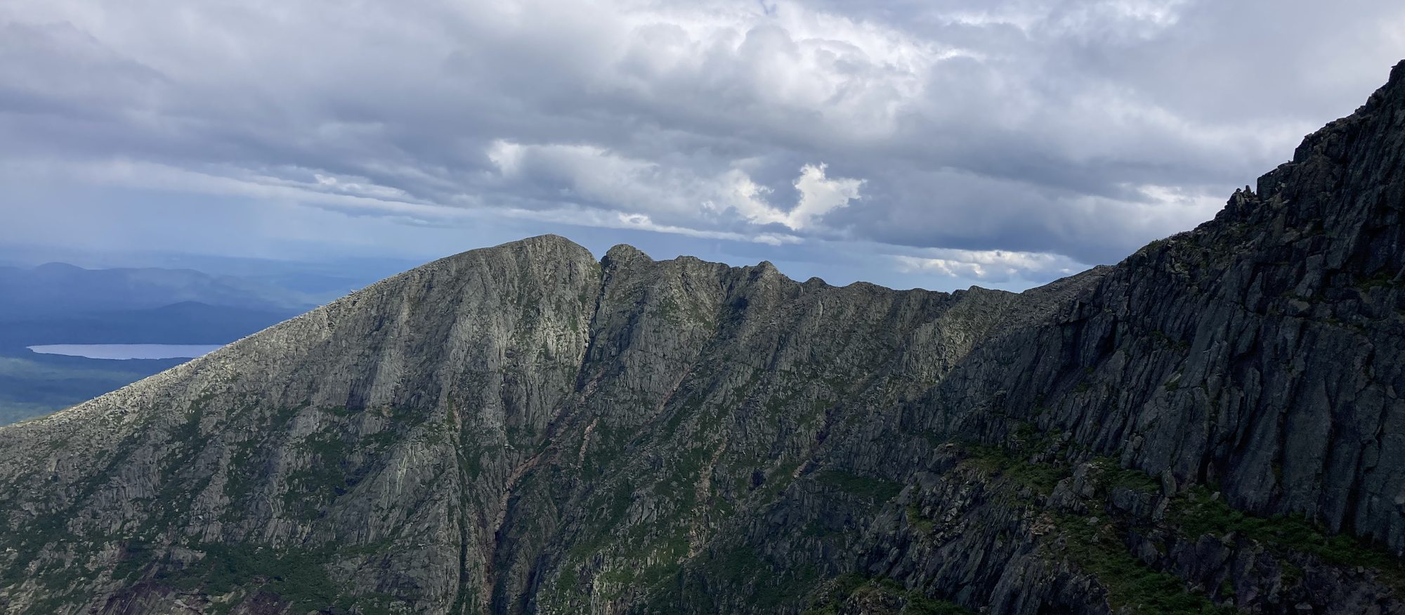Katahdin's Knife Edge ridge under summer clouds